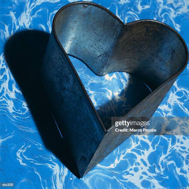 heart-shaped cookie cutter - marco stock pictures, royalty-free photos & images