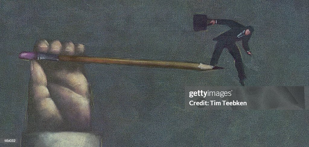 Man Balancing on Pencil Point