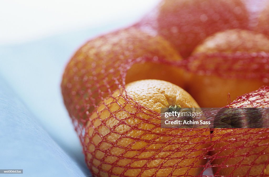 Oranges in net, close up