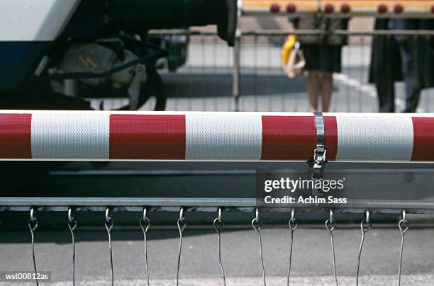 barrier of rail road crossing - boom barrier stock pictures, royalty-free photos & images