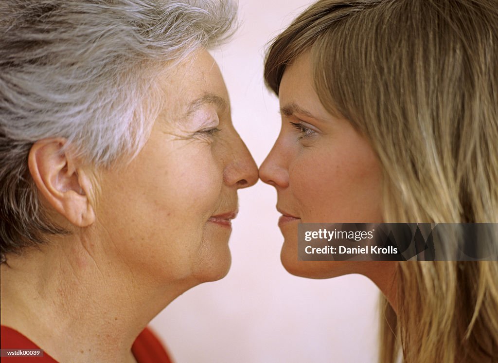 Two women, face to face, close up