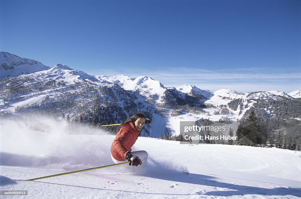 Woman skiing on slope
