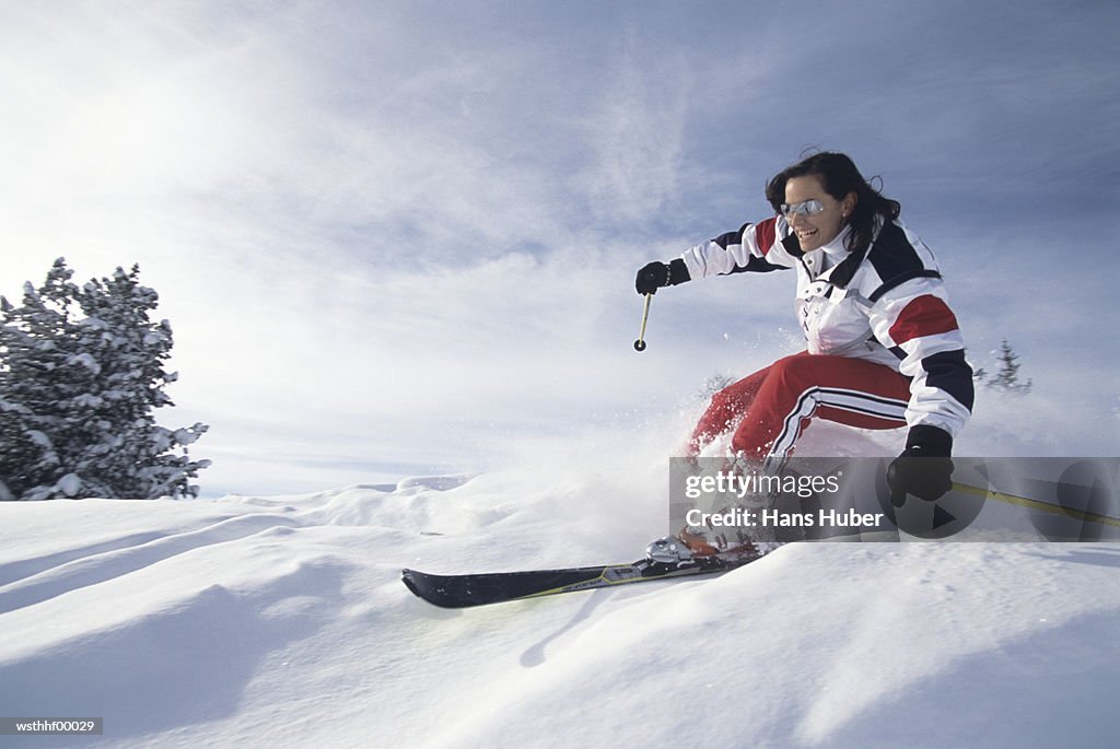 Woman skiing in snow