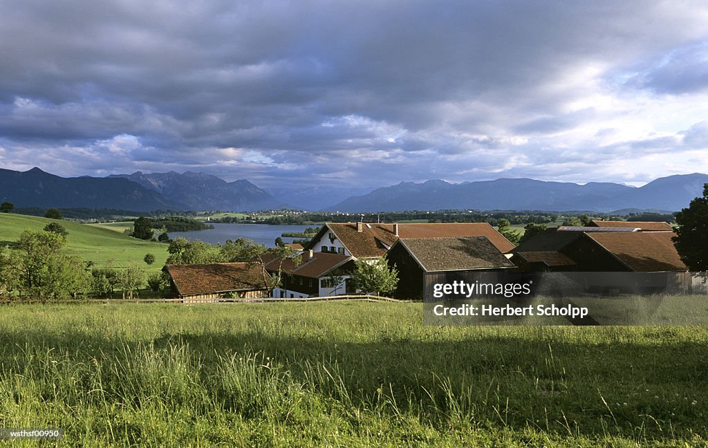 Germany, Bavaria, Murnau, Farm at lake Riegsee