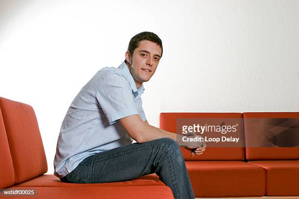 young man sitting, close up - up stock pictures, royalty-free photos & images