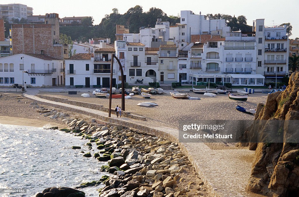 Couple walking, Sant Andreu de la Palomera, Blanes, Costa Brava, Catalonia, Spain