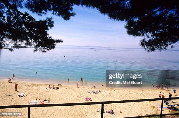 people at canyelles petites, near roses, costa brava, catalonia, spain - costa stock-fotos und bilder