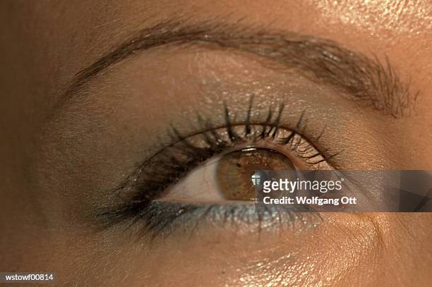 woman's eye, extreme close up - up stock pictures, royalty-free photos & images