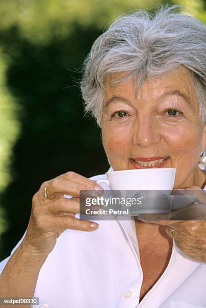 senior woman drinking coffee, close up - up stock pictures, royalty-free photos & images