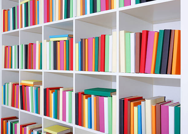 colourful books on a bookcase - 本棚点のイラスト素材／クリップアート素材／マンガ素材／アイコン素材
