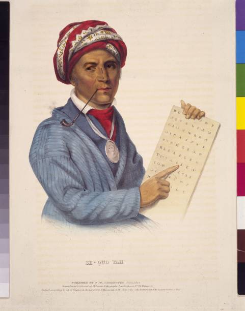 Sequoyah , the son of a British trader and a Cherokee woman who invented a written language for the Cherokees in 1821.