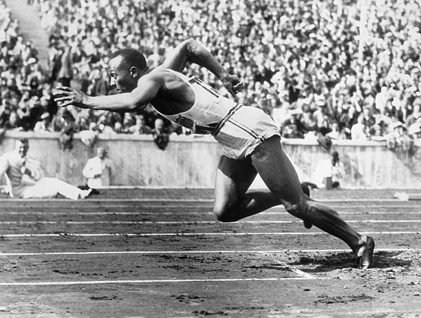 Jesse Owens, runner.