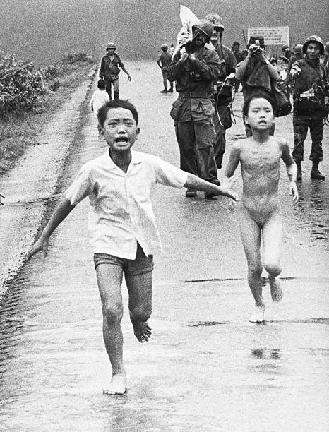 Trang Bang, South Vietnam: Children run along Highway 1 June 8, 1972 in an attempt to escape an accidental napalm attack on Trang Bang, 26 miles...