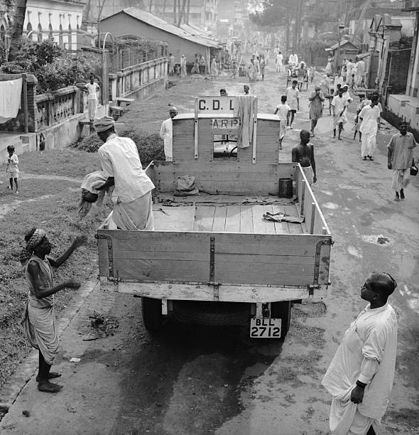 Calcutta, India: Regular Corpse Removal squads were on call in the streets of Calcutta. Famine conditions created by British occupation increased the...