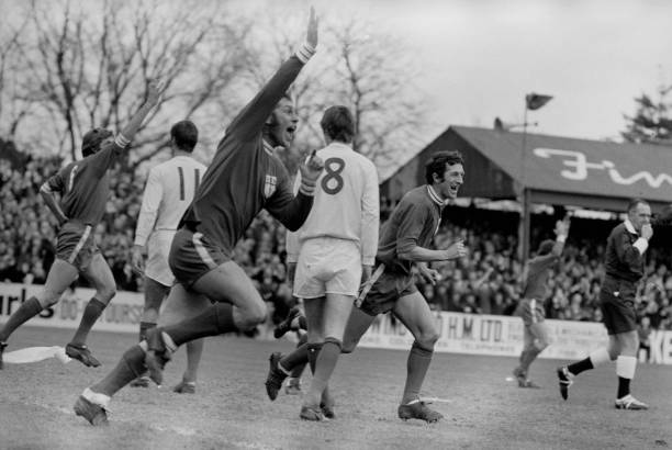 Colchester United's Ray Crawford raising his arm in jubilation after scoring his team's first goal against Leeds United in the fifth round of the FA...