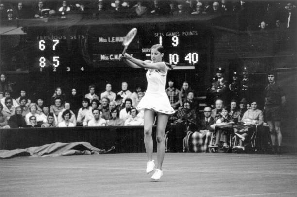 American tennis champion Chris Evert making the winning shot of her 46-game match against Lesley Hunt of Australia on the centre court at Wimbledon.