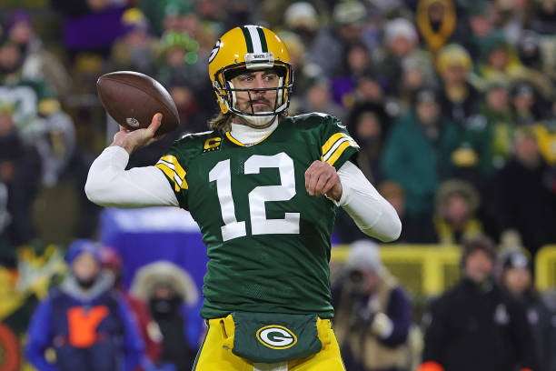 Aaron Rodgers of the Green Bay Packers drops back to pass during a game against the Minnesota Vikings at Lambeau Field on January 02, 2022 in Green...