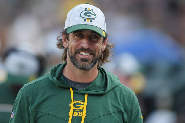 Aaron Rodgers of the Green Bay Packers looks on in the second half against the New York Jets during a preseason game at Lambeau Field on August 21,...