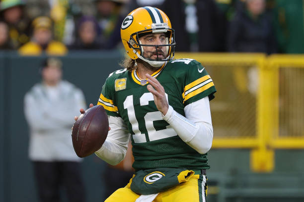 Aaron Rodgers of the Green Bay Packers looks to pass during a game against the Seattle Seahawks at Lambeau Field on November 14, 2021 in Green Bay,...
