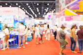 Abstract blurred event exhibition with people background, business convention show concept