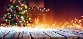 Abstract Christmas - Snowy Table With Bokeh Lights And Defocused Christmas Tree