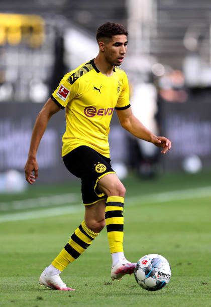 Achraf Hakimi of Dortmund runs with the ball during the Bundesliga match between Borussia Dortmund and Hertha BSC at Signal Iduna Park on June 06...