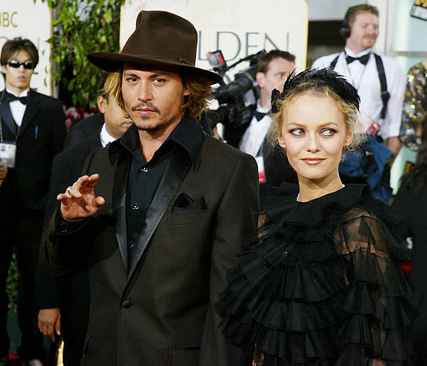 Actor Johnny Depp with Vanessa Paradis attend the 61st Annual Golden Globe Awards at the Beverly Hilton Hotel on January 25, 2004 in Beverly Hills,...