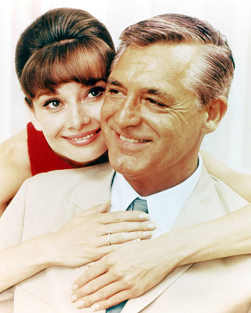 Actors Cary Grant as Peter Joshua and Audrey Hepburn as Regina Lampert in a publicity still for the film `Charade`, 1963.