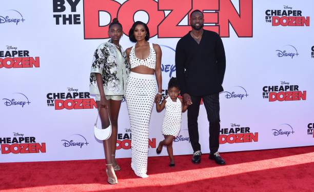 Actress Gabrielle Union and her husband former professional basketball player Dwayne Wade pose with daughters Zaya Wade and Kaavia James Union Wade...