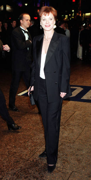 actress-samantha-bond-who-plays-miss-moneypenny-arrives-for-the-of-picture-id830286774?k=6&m=830286774&s=612x612&w=0&h=ssLR0zmw41JKb8RyNbY714RHiH8QzOXK2SyDjk9BVWo=