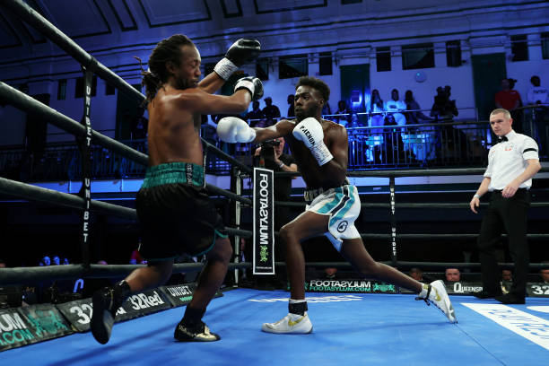 Adan Mohamed punches Reiss Taylor during the Super Bantamweight fight between Adan Mohamed and Reiss Taylor at York Hall on September 16, 2022 in...