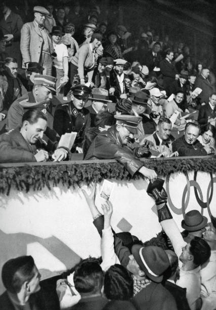 adolf-hitler-signs-autographs-winter-olympic-games-germany-1936-a-picture-id463951111