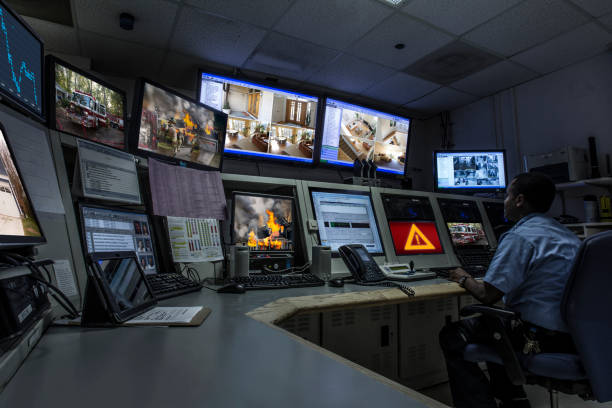 african american security officer working in control room picture