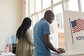 African-American People in Voting Booth