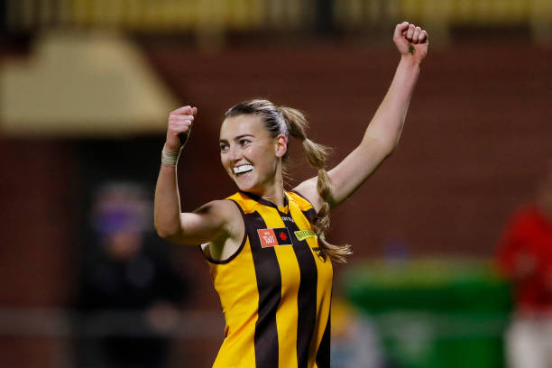 Aine McDonagh of the Hawks celebrates a goal with teammates during the 2022 S7 AFLW Round 06 match between the Hawthorn Hawks and the West Coast...