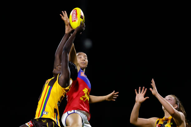 Akec Makur Chuot of Hawthorn attempts to mark the ball during the round nine AFLW match between the Hawthorn Hawks and the Brisbane Lions at SkyBus...