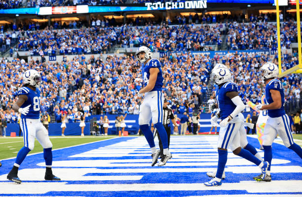 Alec Pierce of the Indianapolis Colts celebrates a touchdown against the Jacksonville Jaguars during the fourth quarter at Lucas Oil Stadium on...