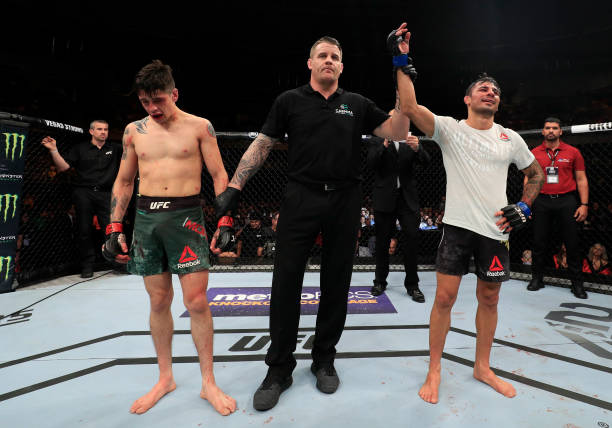 Alexandre Pantoja of Brazil celebrates after defeating Brandon Moreno of Mexico in their flyweight bout during the UFC Fight Night event at Movistar...