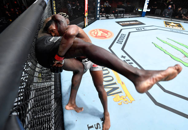 Alonzo Menifield takes down Fabio Cherant in their light heavyweight fight during the UFC 260 event at UFC APEX on March 27, 2021 in Las Vegas,...