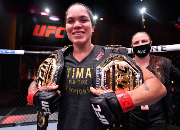 Amanda Nunes of Brazil celebrates after her unanimous-decision victory over Felicia Spencer of Canada in their UFC featherweight championship bout...