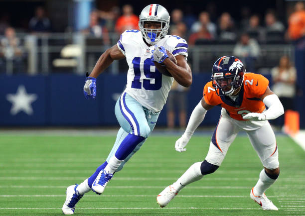 Amari Cooper of the Dallas Cowboys catches the ball in front of Pat Surtain II of the Denver Broncos during the first quarter at AT&T Stadium on...