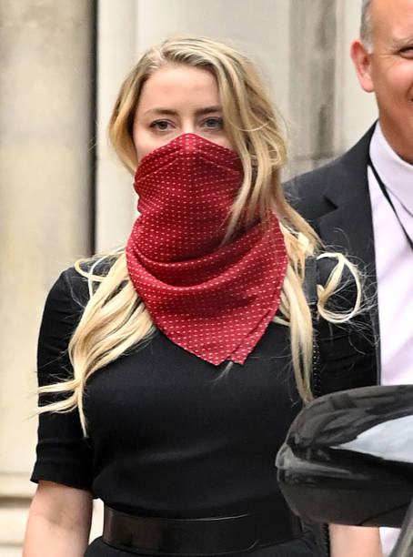 Amber Heard departs after attending day one of Johnny Depp's libel case against the Sun Newspaper at the Royal Courts of Justice Strand on July 07...
