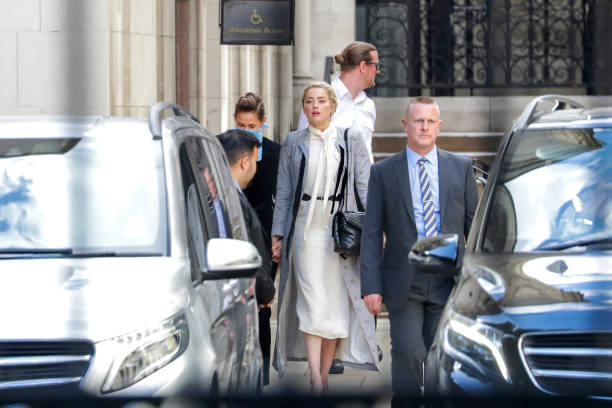 Amber Heard leaves the Royal Courts of Justice Strand on July 21 2020 in London England The Hollywood Actor is suing News Group Newspapers and the...