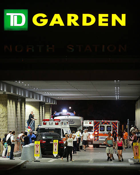ambulances-are-lined-up-outside-of-the-garden-as-concert-goers-leave-picture-id451259388