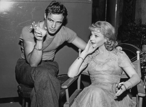 American actor Marlon Brando and British stage and film actress Vivien Leigh relax on the set of `A Streetcar Named Desire`, circa 1951.