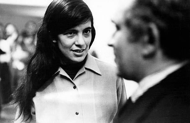 American authors Susan Sontag and Norman Mailer talk together at the Resist the Draft rally, New York, New York, January 14, 1968.