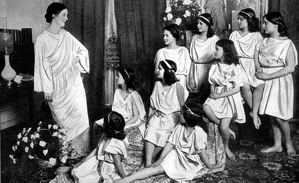 American dancer and choreographer Isadora Duncan 1878-1927 with some of her pupils, including one of her own daughters during a dance lesson