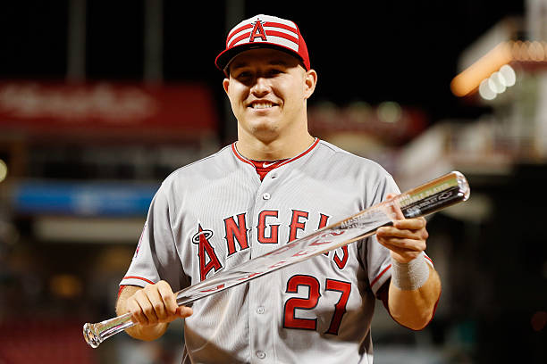 American League All-Star Mike Trout of the Los Angeles Angels of Anaheim poses with the MVP trophy after defeating the National League 6 to 3 in the...