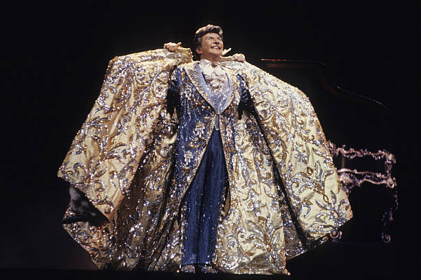 american-musician-liberace-performs-at-radio-city-music-hall-new-york-picture-id83458944