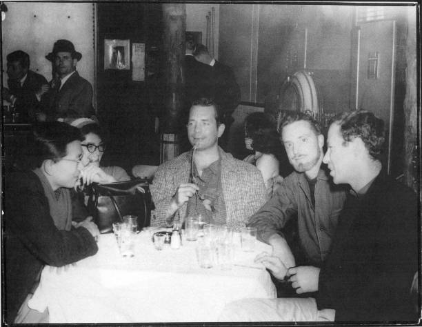 American writers Albert Saijo , Jack Kerouac , and Lew Welch sit with soon-to-be married couple Gloria Schoffel and photographer Fred McDarrah at a...